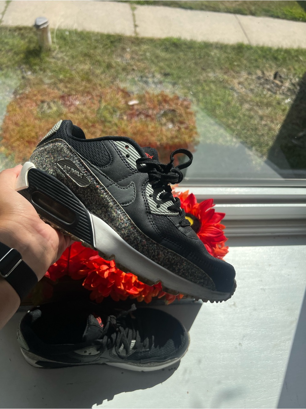 Nike Kids Black Sneakers with Speckled Multi-Color Accents